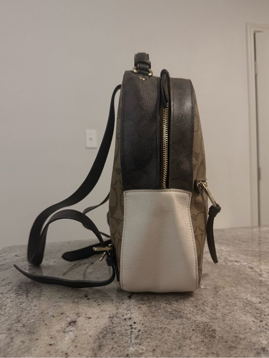 coach backpack tan You can easily slip items in the outer side pockets to keep them accessible making this canvas backpack a favorite for every daywhether youre heading to work school or a day out with friends. Coach Elle Backpack Tan Leather